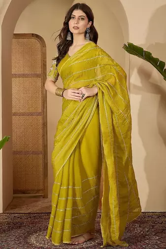 Yellow embellished beads and stones saree