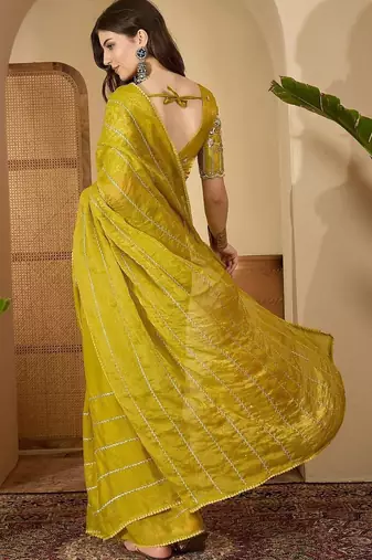 Yellow embellished beads and stones saree