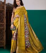 Mustard ethnic printed festive wear tussar saree with unstitched blouse piece