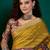Mustard ethnic printed festive wear tussar saree with unstitched blouse piece