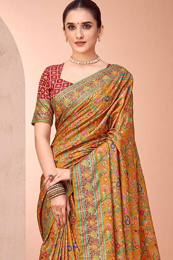 Mustard ethnic motifs printed patola saree