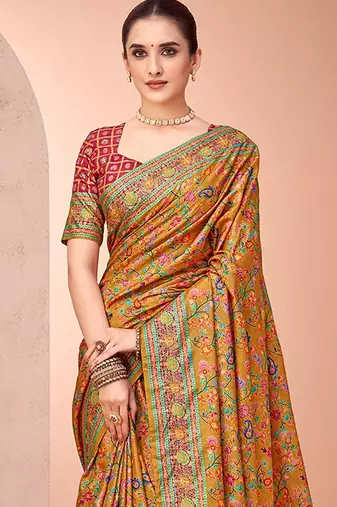 Mustard ethnic motifs printed patola saree