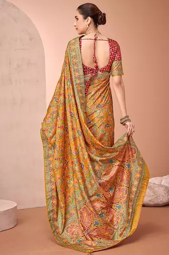 Mustard ethnic motifs printed patola saree