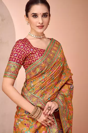 Mustard ethnic motifs printed patola saree
