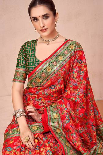 Red ethnic motifs printed festive wear saree with matching unstitched blouse