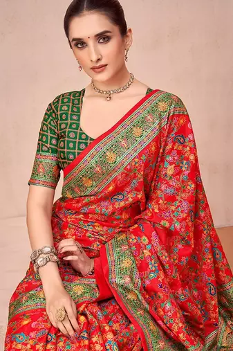 Red ethnic motifs printed festive wear saree with matching unstitched blouse