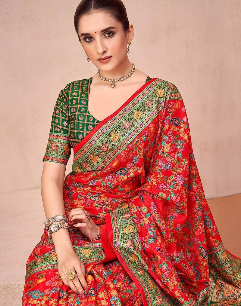 Red ethnic motifs printed festive wear saree with matching unstitched blouse