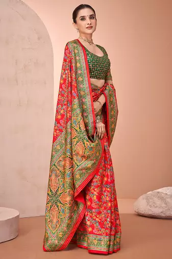 Red ethnic motifs printed festive wear saree with matching unstitched blouse