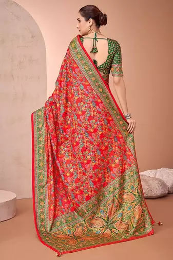 Red ethnic motifs printed festive wear saree with matching unstitched blouse