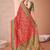 Red ethnic motifs printed festive wear saree with matching unstitched blouse