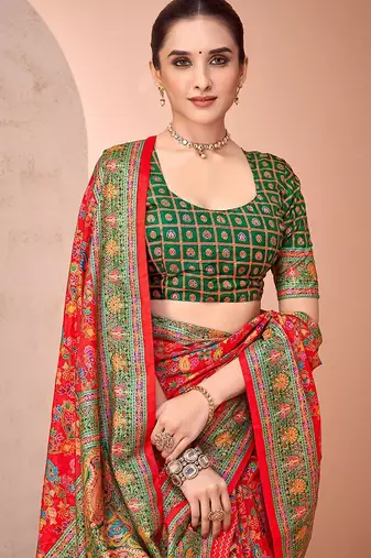 Red ethnic motifs printed festive wear saree with matching unstitched blouse