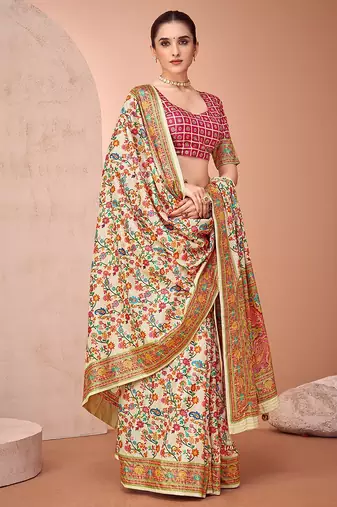 Beige ethnic motifs printed festive wear saree with matching unstitched blouse
