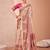 Cream ethnic motif printed patola saree