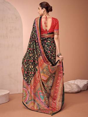 Black women paisley printed patola saree 3