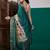 Teal ethnic motifs printed zari saree with unstitched blouse