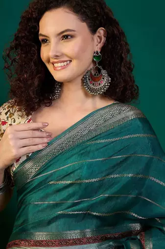 Teal ethnic motifs printed zari saree with unstitched blouse