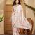 Off white abstract printed saree with embellished border & unstitched blouse