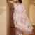 Off white abstract printed saree with embellished border & unstitched blouse