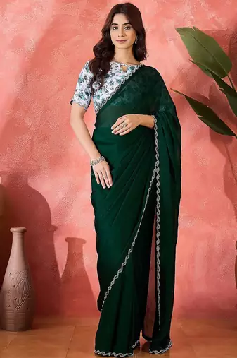 Green embellished banarasi saree with blouse piece
