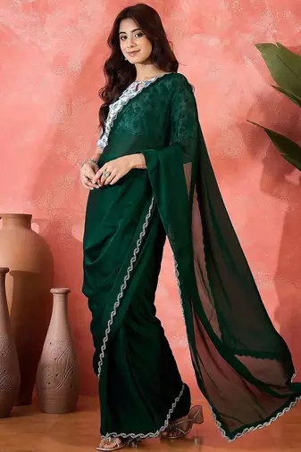 Green embellished banarasi saree with blouse piece