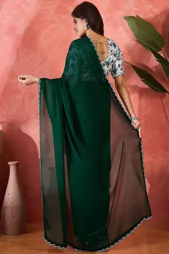 Green embellished banarasi saree with blouse piece