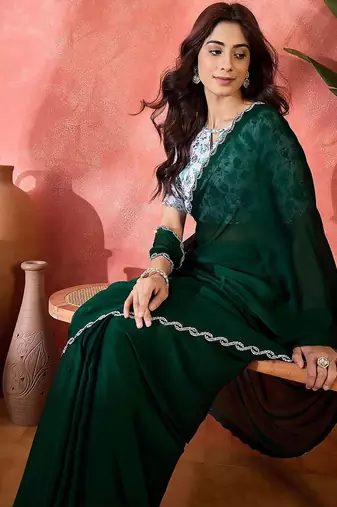 Green embellished banarasi saree with blouse piece