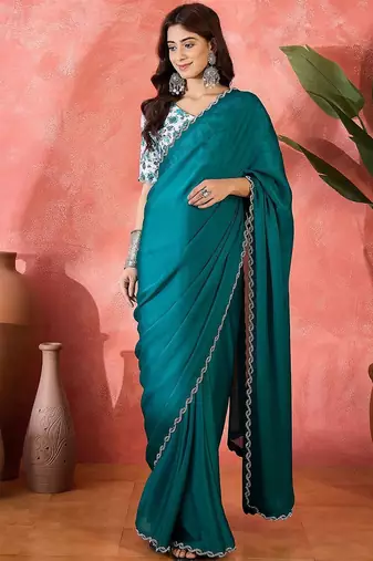 Teal embellished banarasi saree with blouse piece