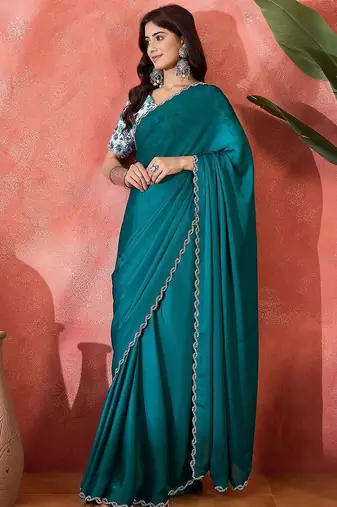 Teal embellished banarasi saree with blouse piece
