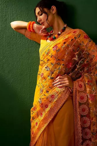 Mustard embroidered net sarees