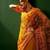 Mustard embroidered net sarees