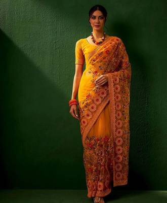 Mustard embroidered net sarees 3