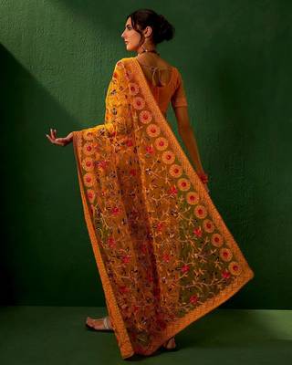 Mustard embroidered net sarees 5