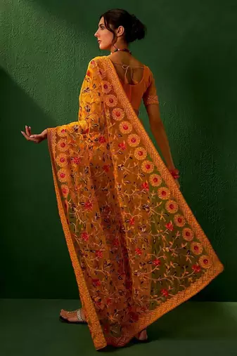 Mustard embroidered net sarees