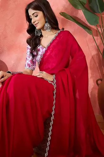 Rust embellished banarasi saree with blouse piece