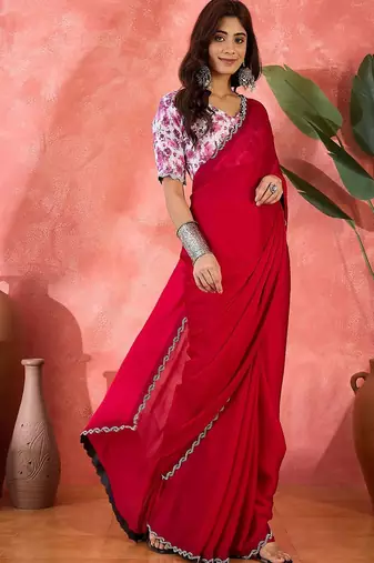 Rust embellished banarasi saree with blouse piece