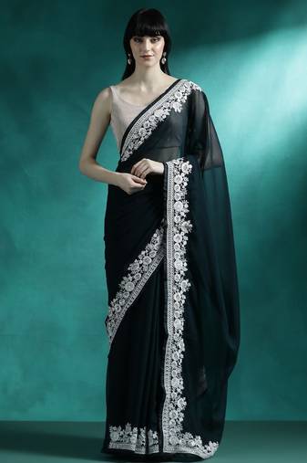 Teal solid saree with blouse piece
