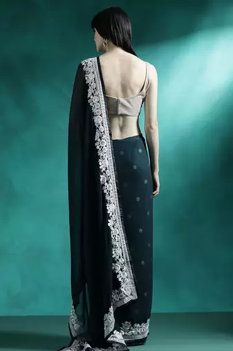 Teal solid saree with blouse piece