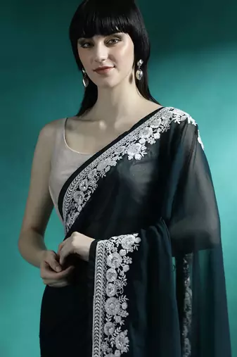 Teal solid saree with blouse piece