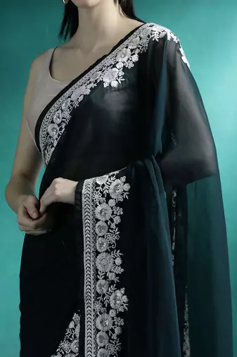 Teal solid saree with blouse piece