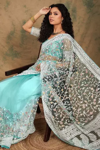 Sea green floral embroidered net sarees