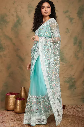 Sea green floral embroidered net sarees