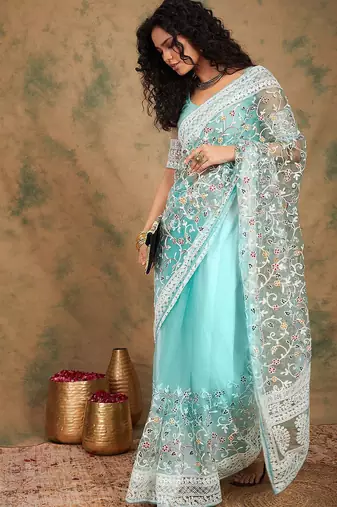 Sea green floral embroidered net sarees