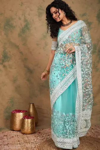 Sea green floral embroidered net sarees