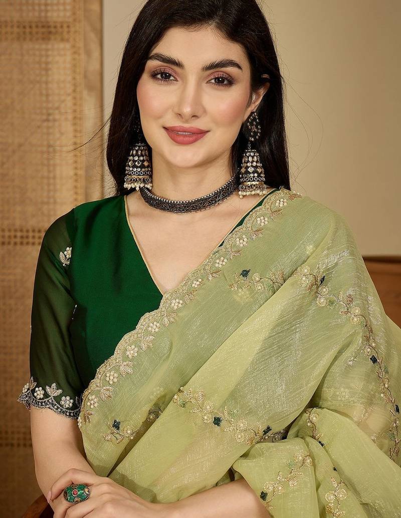 Green embroidered chiffon saree
