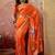 Orange floral embroidered saree with blouse piece