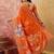 Orange floral embroidered saree with blouse piece