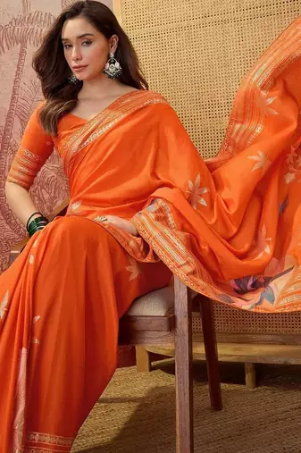 Orange floral embroidered saree with blouse piece