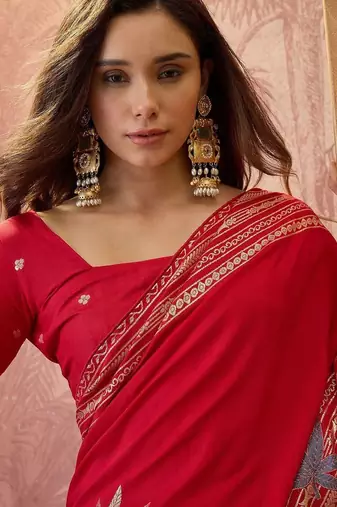 Red zari woven saree with blouse piece