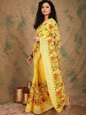 Yellow embroidered net sarees 2