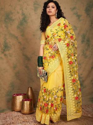 Yellow embroidered net sarees 4